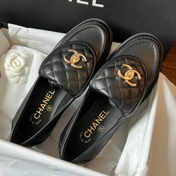 CHANEL Black Quilted Flats with Gold Emblem - Picture 1 of 4